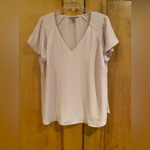 Dusty pink colored V-neck top
